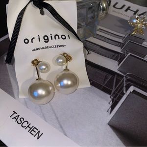 Stunning oversized pearl earrings